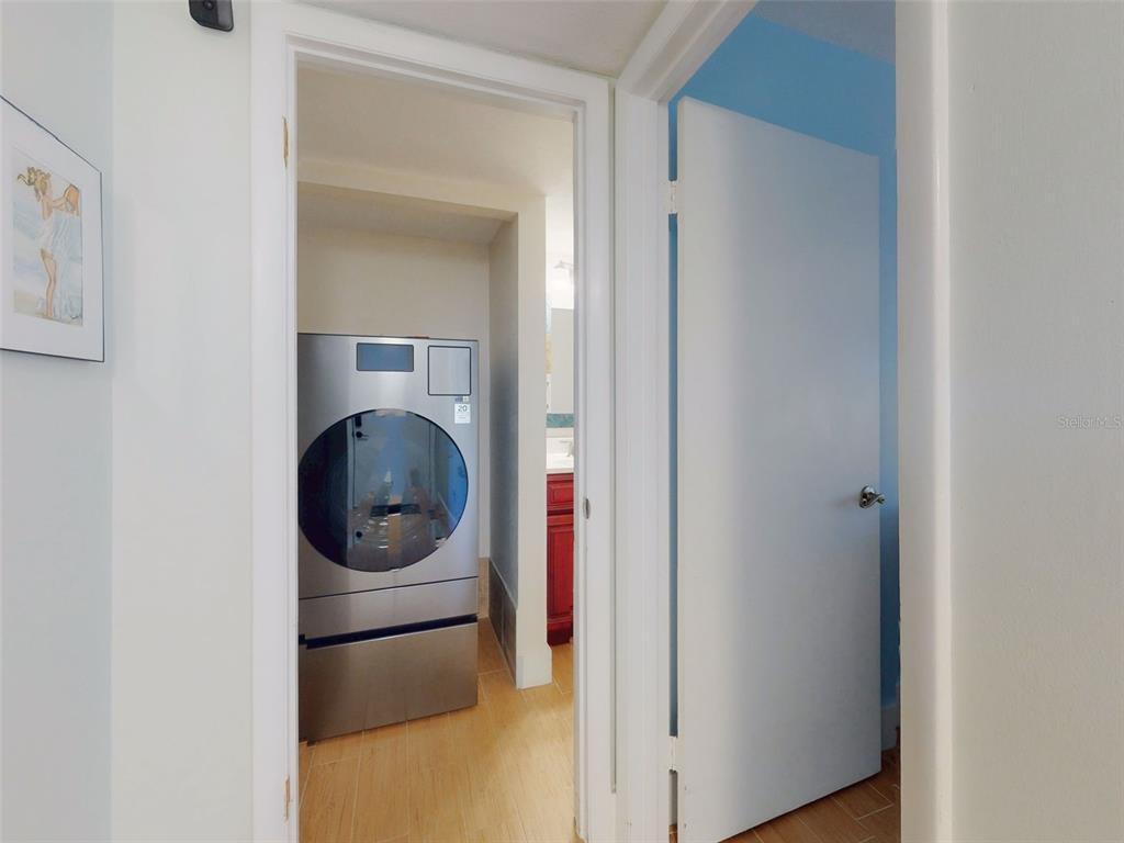 588 Bahia Circle, Unit A Ocala, FL 34472 - Photo 30 of 49 a utility room with dryer and washer