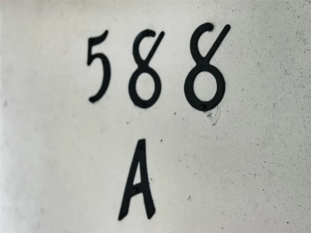 a view of a garden with an ocean