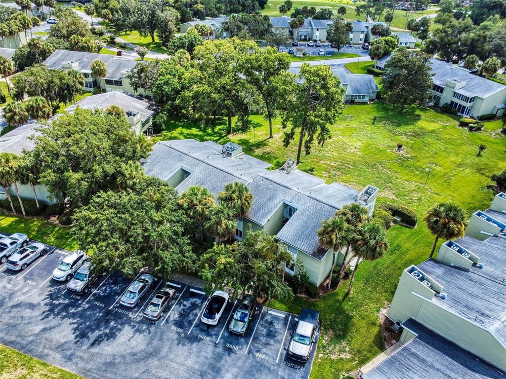 588 Bahia Circle, Unit A Ocala, FL 34472 - Photo 36 of 49 an aerial view of residential house with yard and outdoor seating