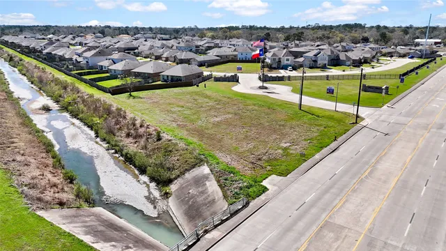a view of a backyard with sitting area
