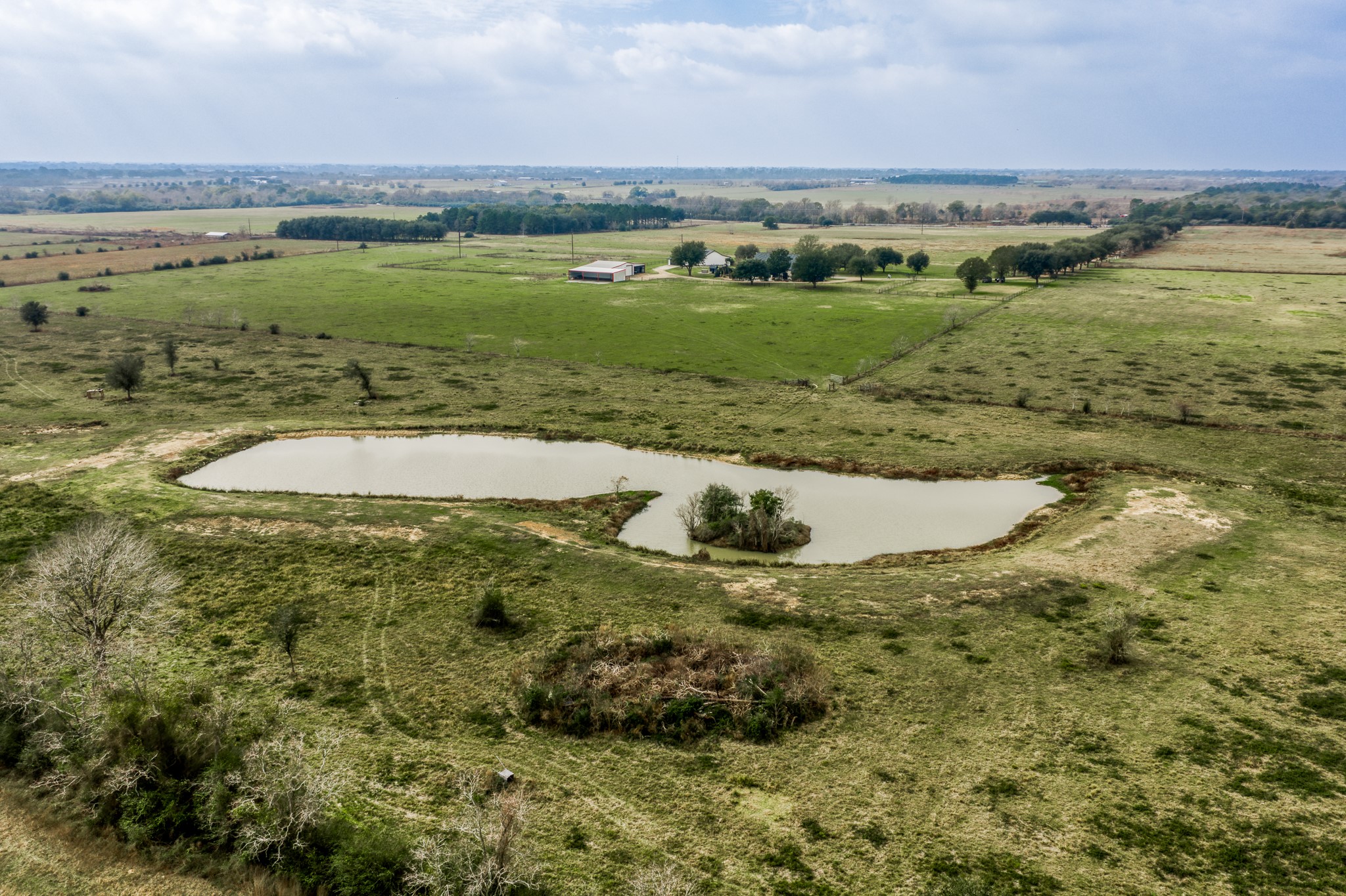 16450 Mathis Road Hockley, TX 77447 - Photo 12 of 39 a view of a lake with a yard