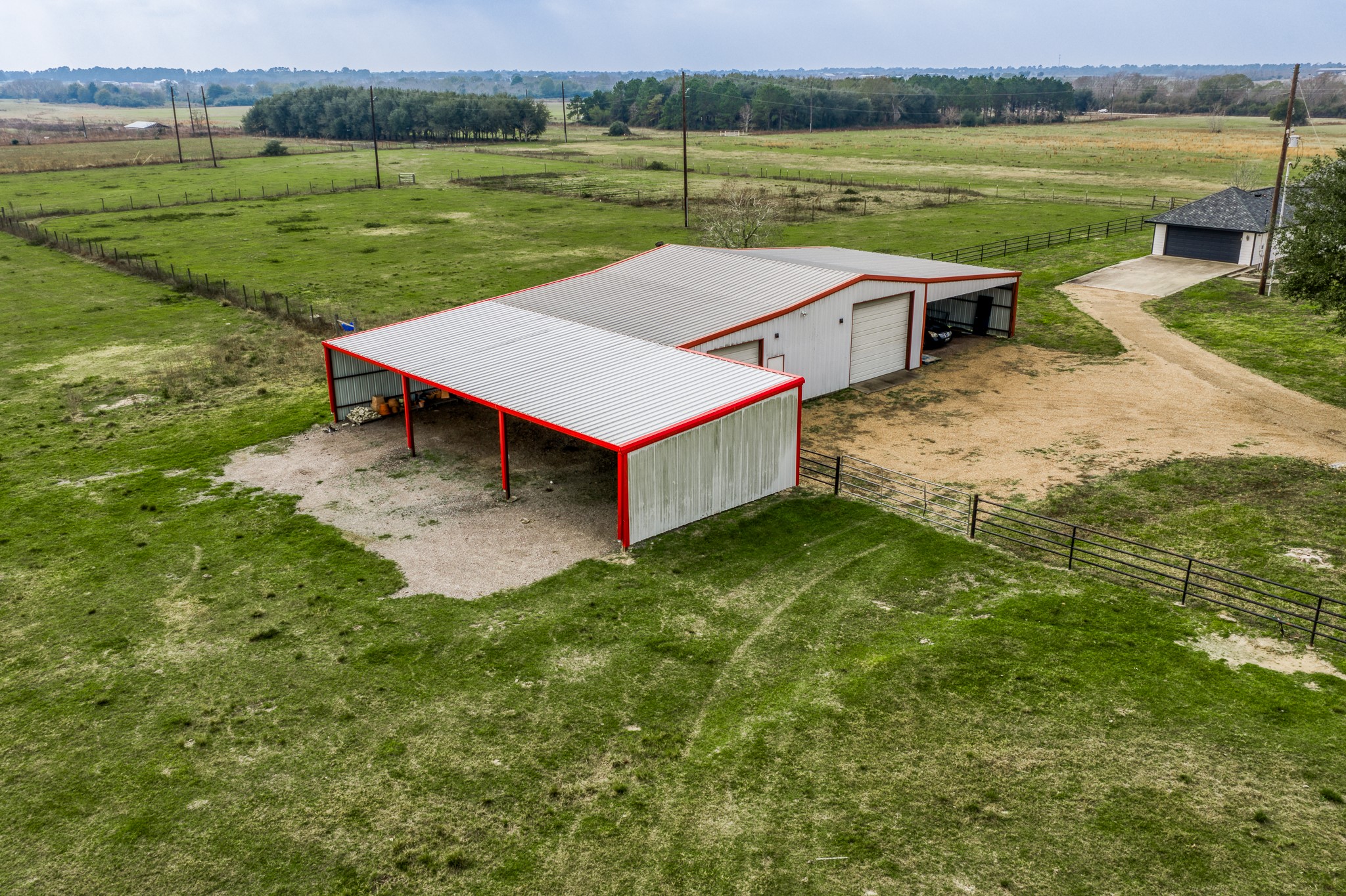 16450 Mathis Road Hockley, TX 77447 - Photo 14 of 39 a view of a house with a yard and a lake view