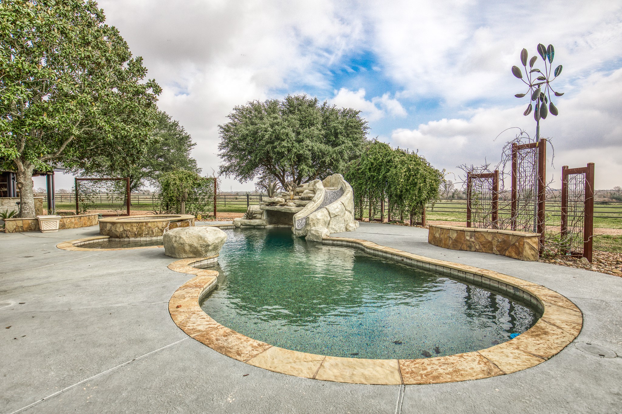 16450 Mathis Road Hockley, TX 77447 - Photo 28 of 39 a view of a swimming pool with outdoor seating