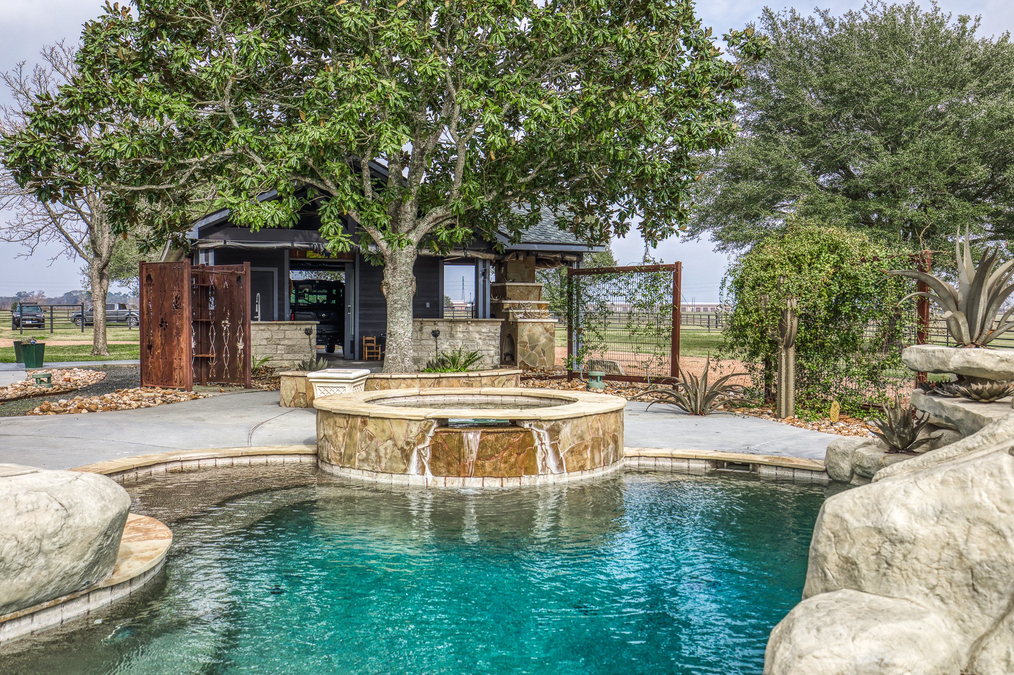 16450 Mathis Road Hockley, TX 77447 - Photo 31 of 39 a view of a house with swimming pool and sitting area