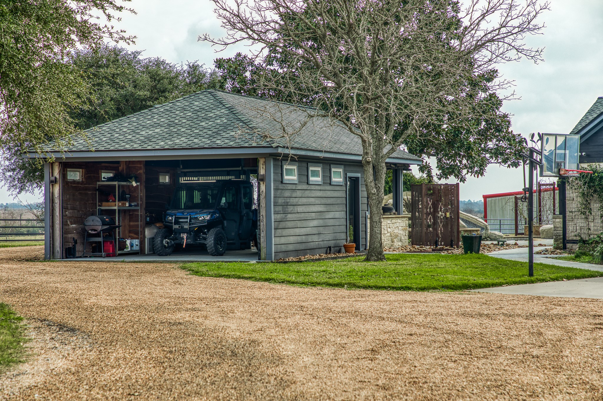 16450 Mathis Road Hockley, TX 77447 - Photo 36 of 39 a view of a house with a patio and a yard