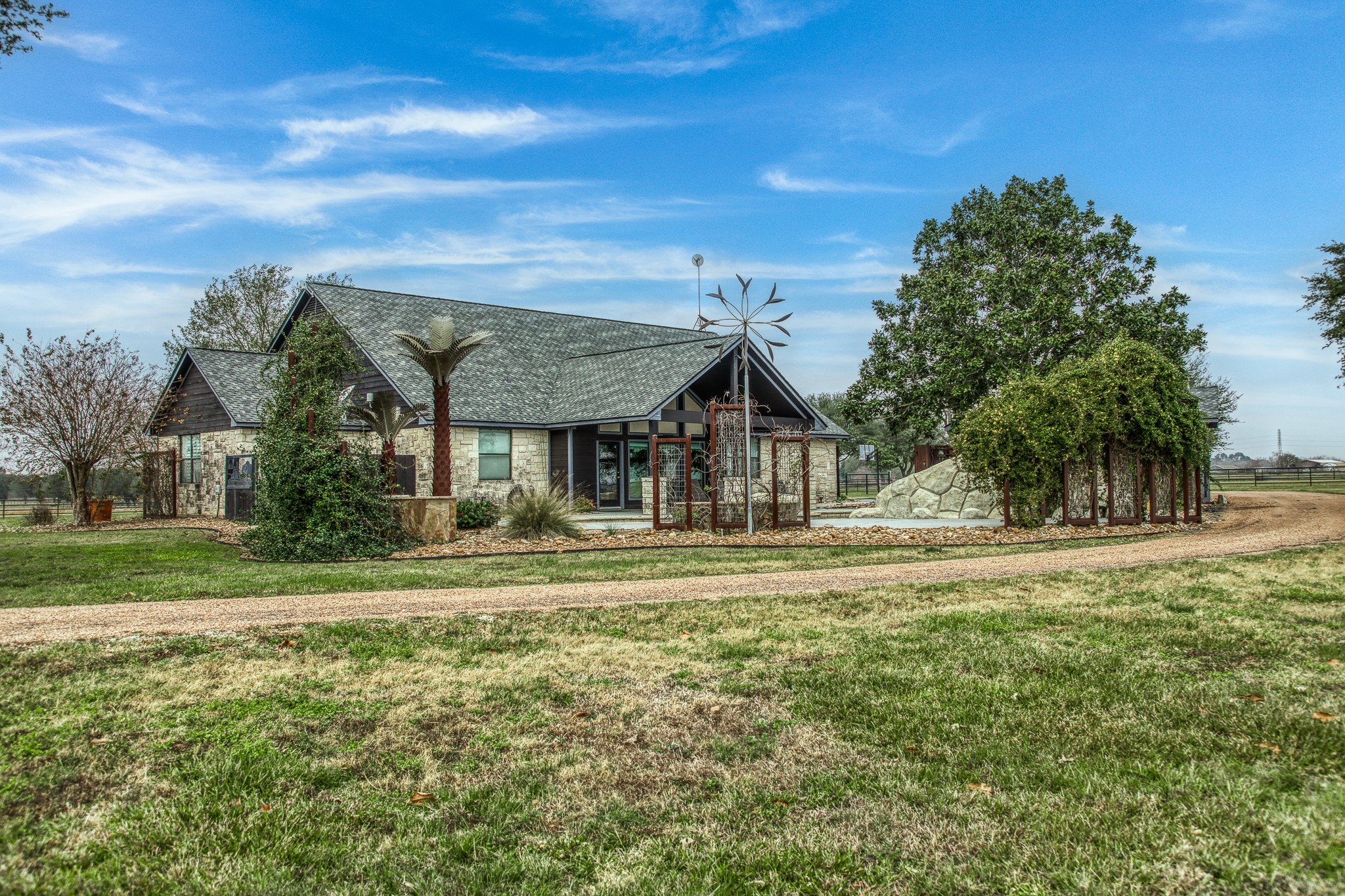 16450 Mathis Road Hockley, TX 77447 - Photo 38 of 39 a front view of a house with a garden