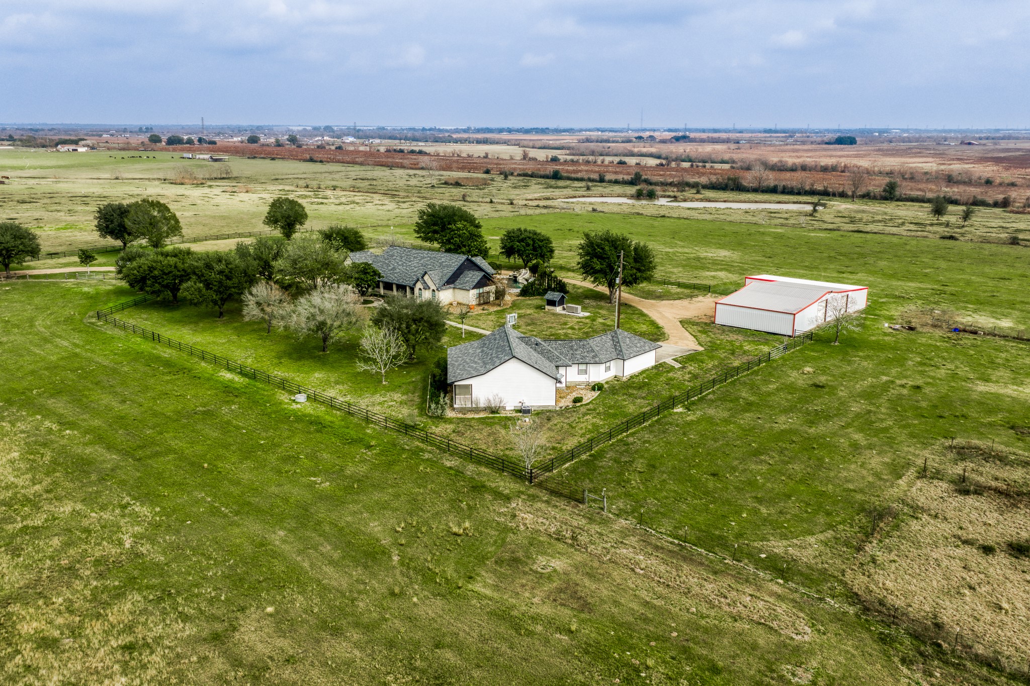 16450 Mathis Road Hockley, TX 77447 - Photo 10 of 39 a view of a lake with a city