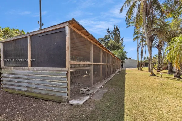 a view of a park with palm trees