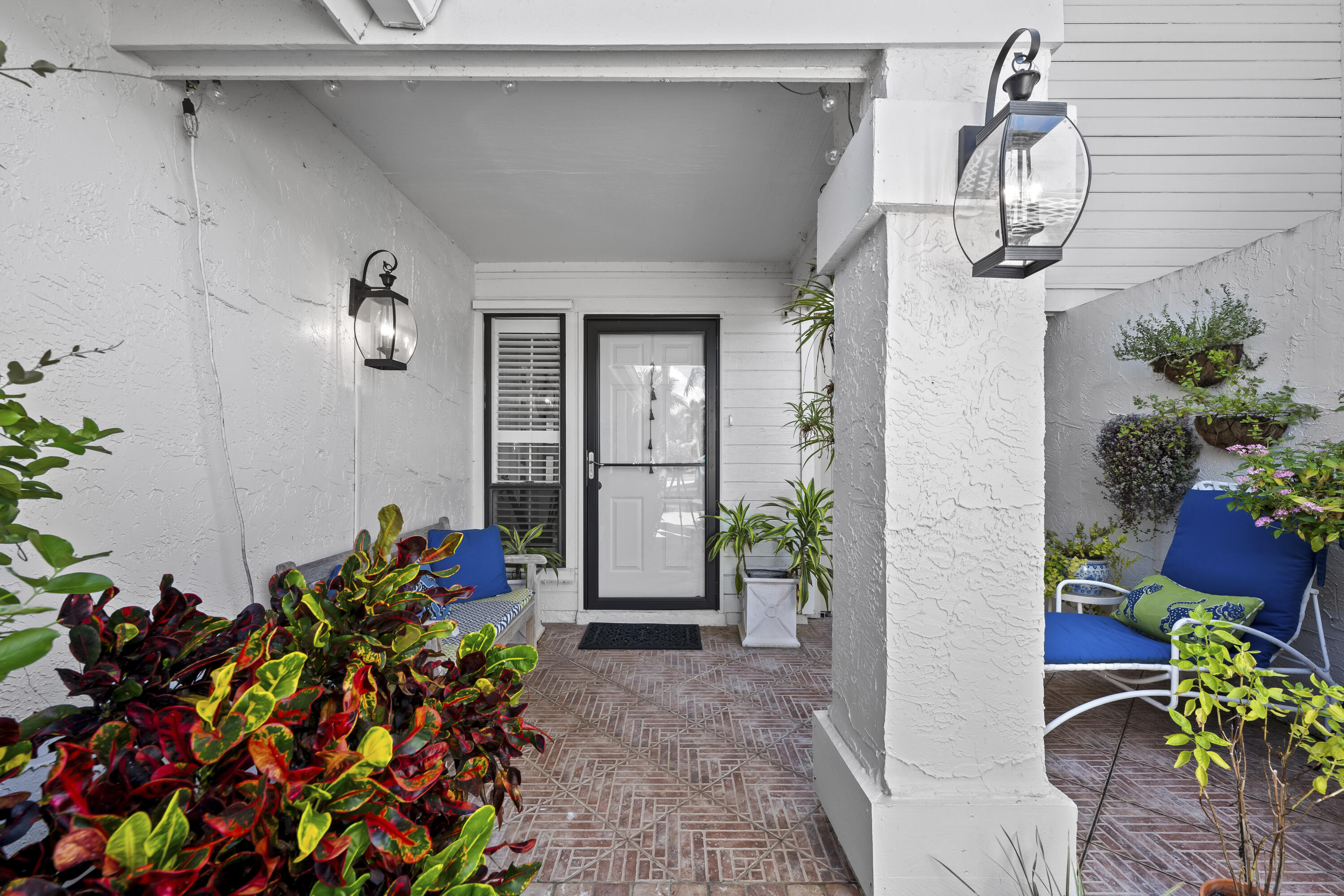 5610 Southeast Foxcross Place Stuart, FL 34997 - Photo 2 of 39 a front view of a house