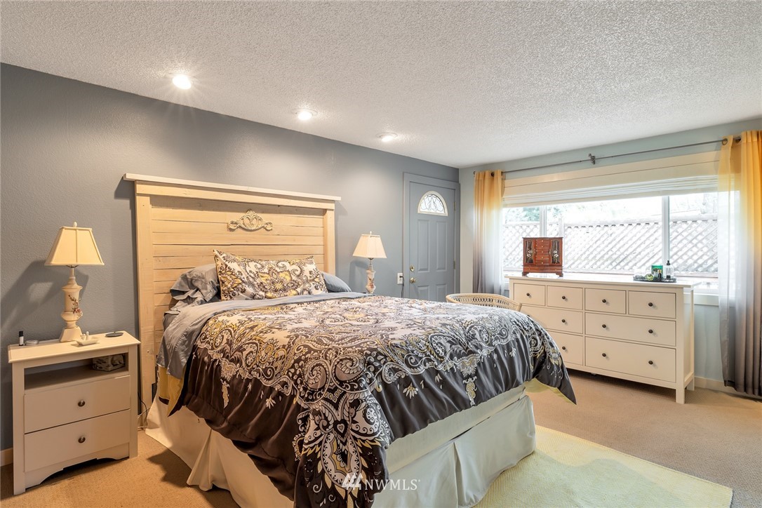 2603 177th Street Southeast Bothell, WA 98012 - Photo 12 of 25 a bedroom with a bed and a window