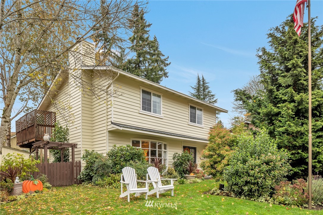 2603 177th Street Southeast Bothell, WA 98012 - Photo 25 of 25 a white house with a yard and sitting area