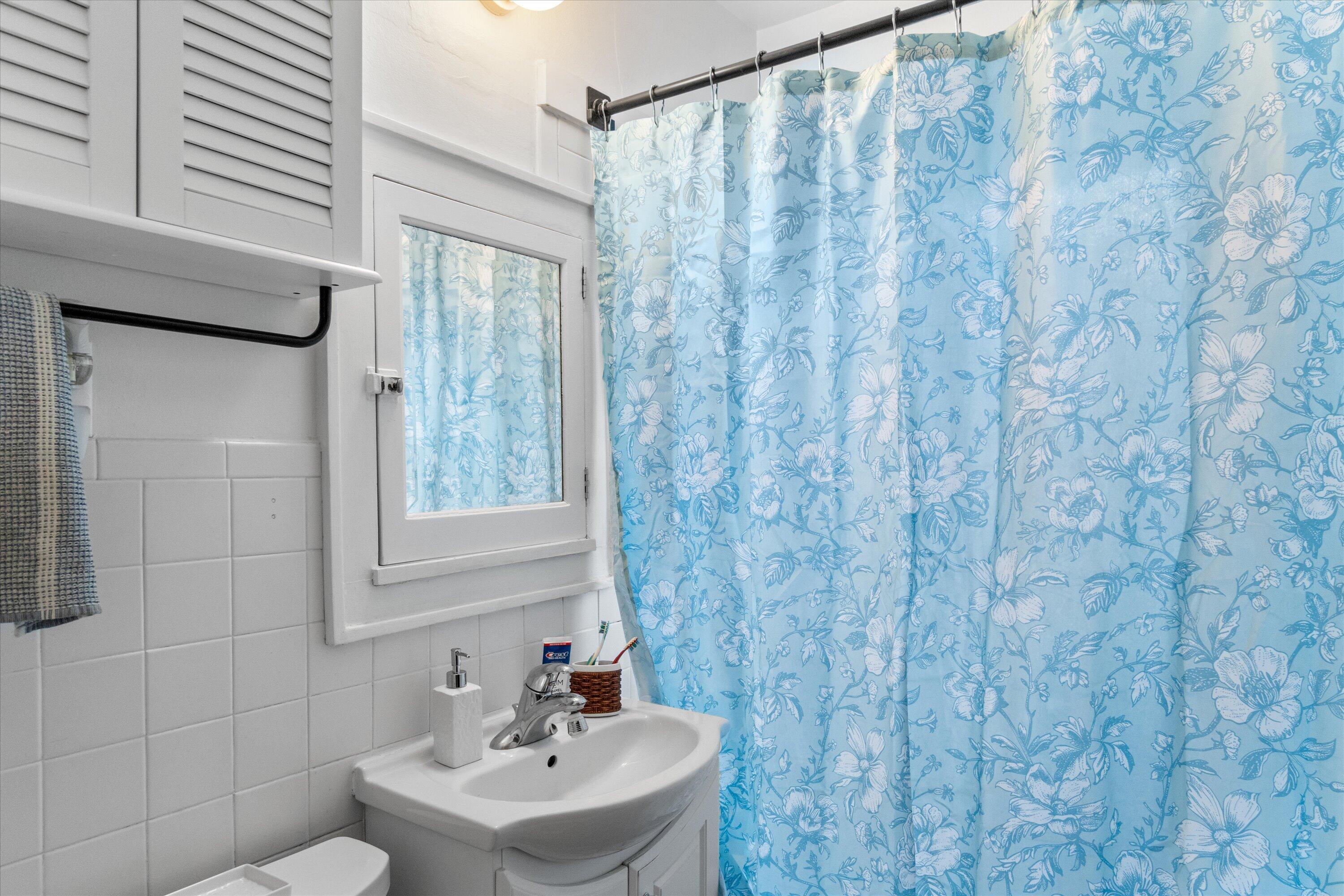 159 North 59th Street Milwaukee, WI 53213 - Photo 34 of 34 Full bathroom with tub/shower combo and convenient storage