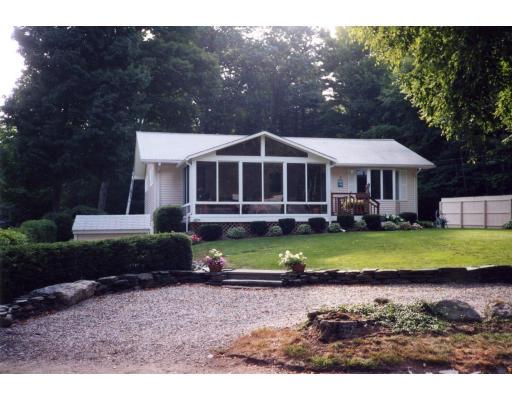 72 South Shore Road Westhampton, MA 01027 - Photo 1 of 10 a front view of a house with a yard