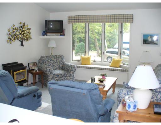 72 South Shore Road Westhampton, MA 01027 - Photo 7 of 10 a living room with furniture and a flat screen tv
