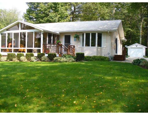 72 South Shore Road Westhampton, MA 01027 - Photo 9 of 10 a view of a house with a yard deck and a garden