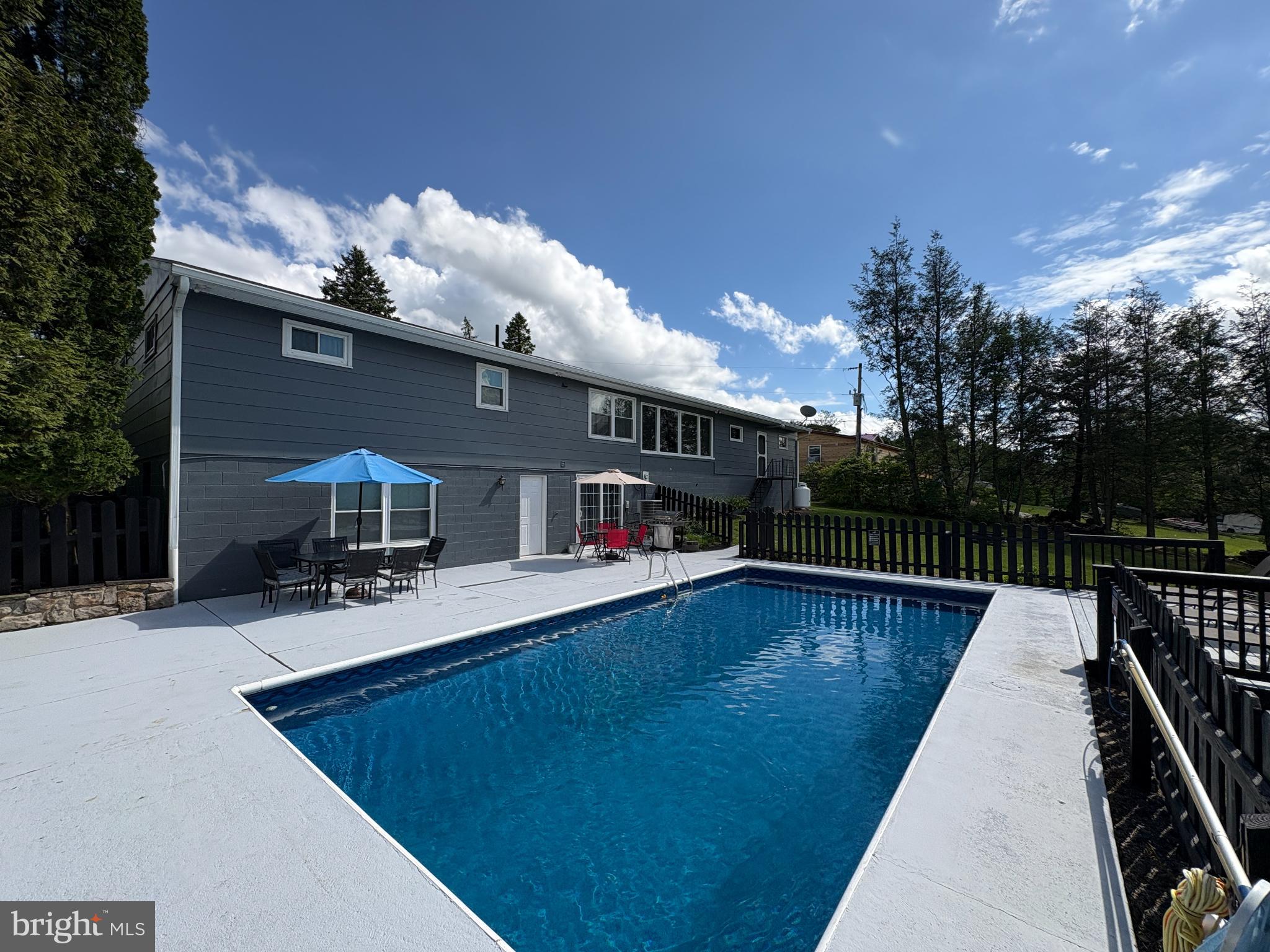 13644 Upper Corners Road Hesston, PA 16647 - Photo 23 of 28 Sunny retreat with a refreshing pool.