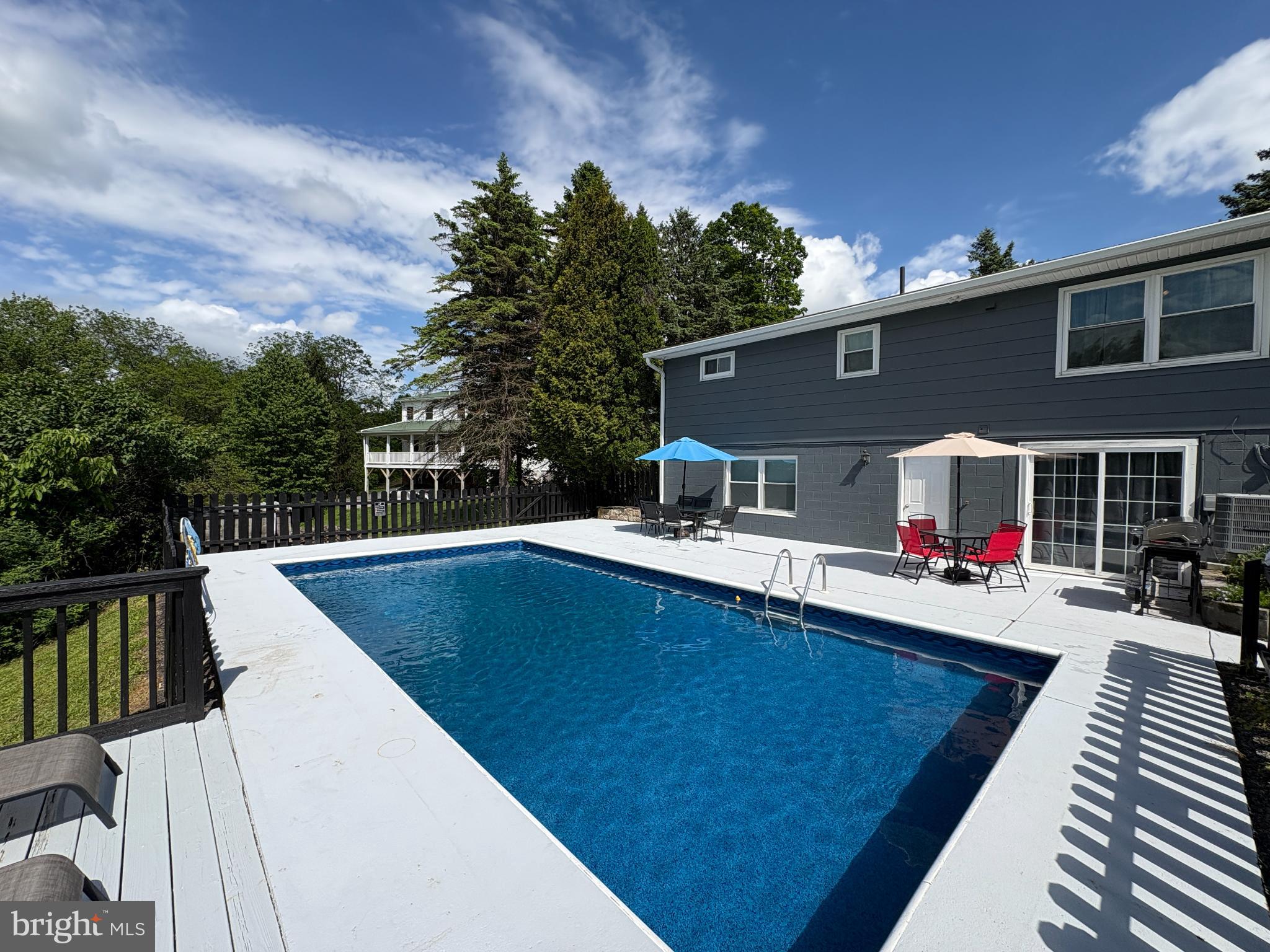 13644 Upper Corners Road Hesston, PA 16647 - Photo 25 of 28 Sunny retreat with a sparkling pool oasis.