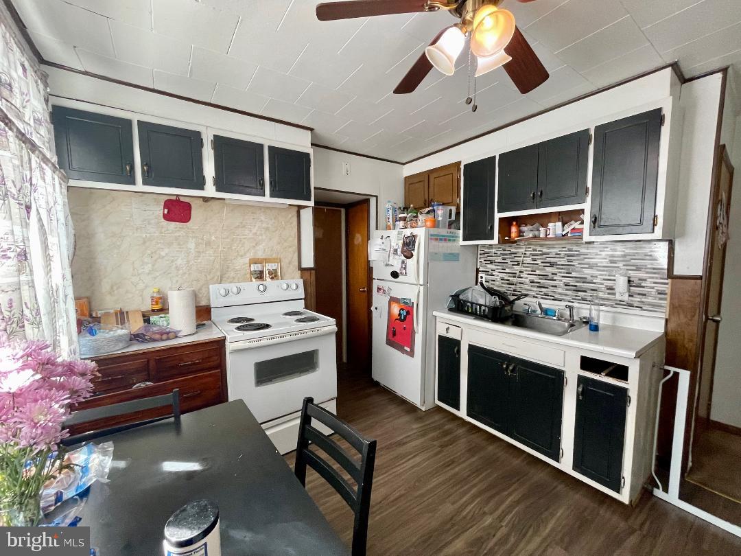 904-906 Main Avenue Croydon, PA 19021 - Photo 39 of 51 a kitchen with stainless steel appliances kitchen island granite countertop a stove and a sink
