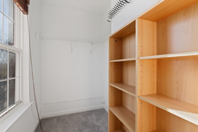 770 Lambert Lane, Unit 966 Bartlett, IL 60103 - Photo 22 of 33 a view of an empty walk in closet