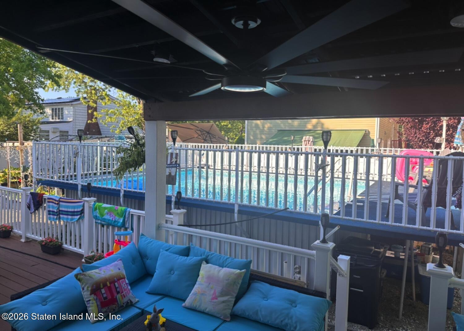 69 Stecher Street Staten Island, NY 10312 - Photo 40 of 45 a view of a porch with furniture