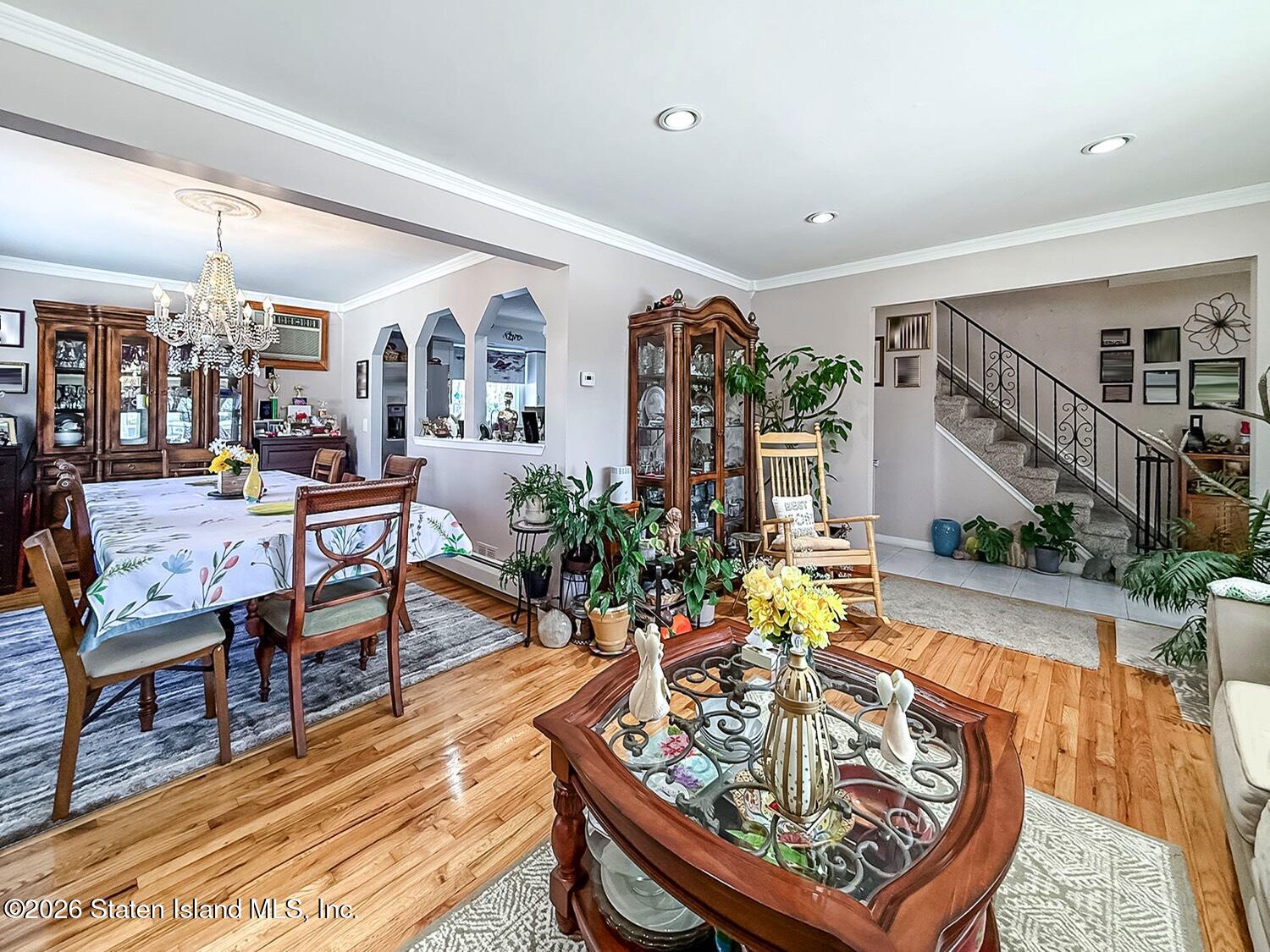 69 Stecher Street Staten Island, NY 10312 - Photo 6 of 45 a living room with furniture and a table