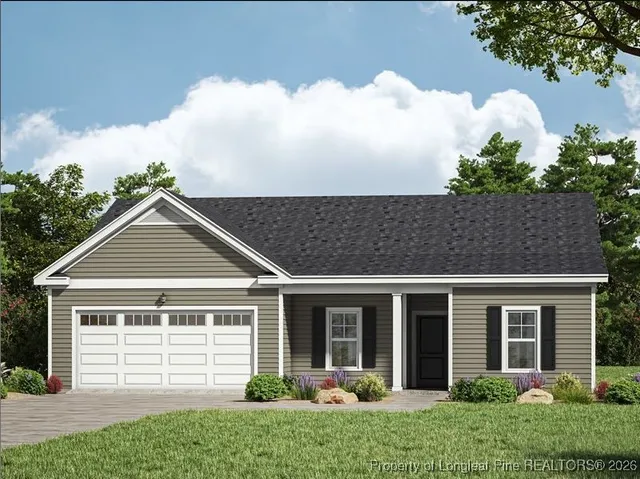 front view of a house and a yard