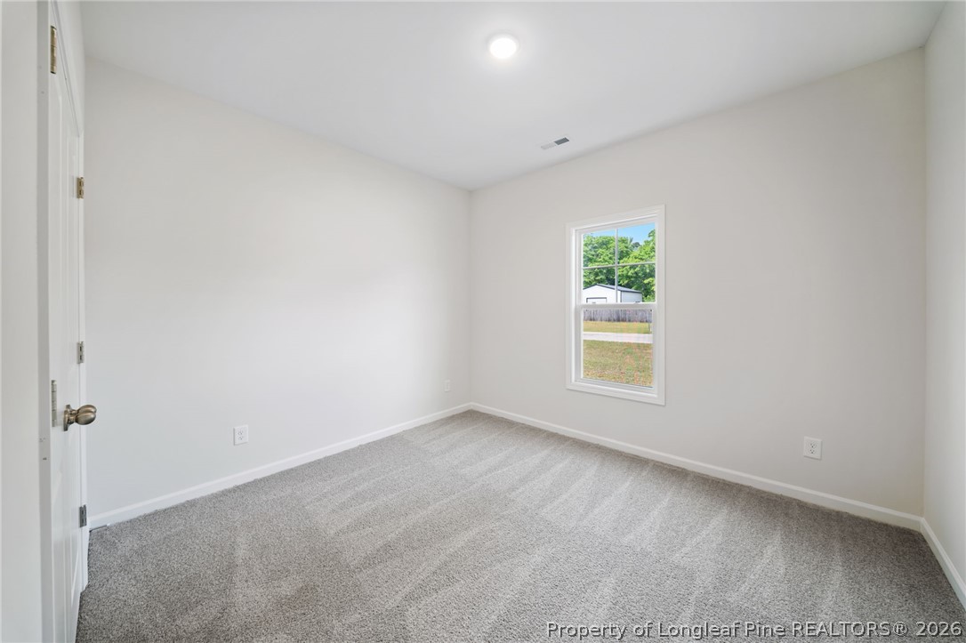 4044 Lofton Street Wade, NC 28395 - Photo 19 of 33 a view of room with window
