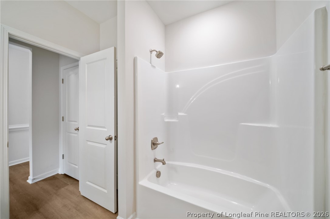 4044 Lofton Street Wade, NC 28395 - Photo 21 of 33 a bathroom with a bathtub