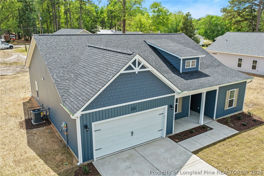 4044 Lofton Street Wade, NC 28395 - Photo 23 of 33 a aerial view of a house with a garage