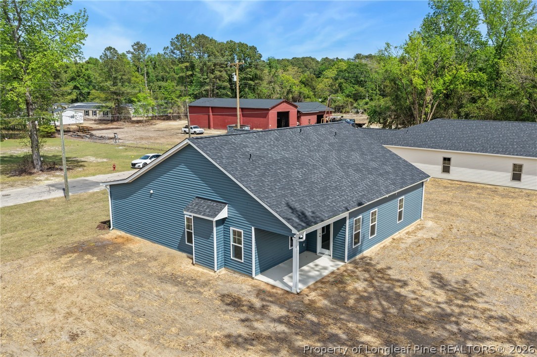 4044 Lofton Street Wade, NC 28395 - Photo 25 of 33 a house view with a swimming pool