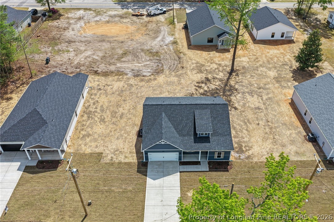 4044 Lofton Street Wade, NC 28395 - Photo 27 of 33 view of house with yard