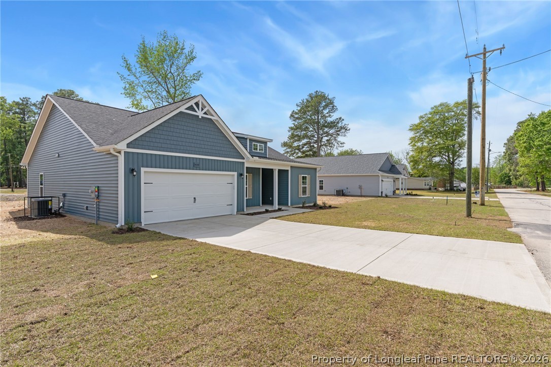 4044 Lofton Street Wade, NC 28395 - Photo 31 of 33 a house with yard and a outdoor space