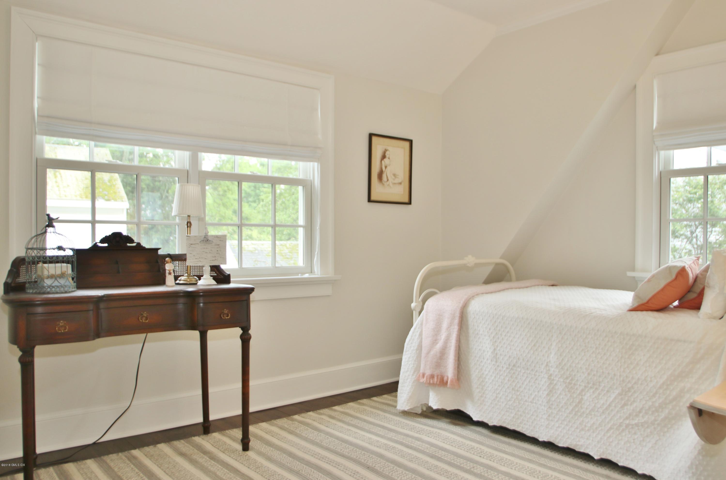 14 Terrace Avenue Riverside, CT 06878 - Photo 20 of 28 a bedroom with a bed and a desk