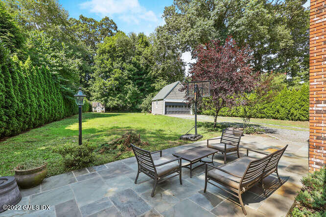 14 Terrace Avenue Riverside, CT 06878 - Photo 25 of 28 a view of a backyard with sitting area