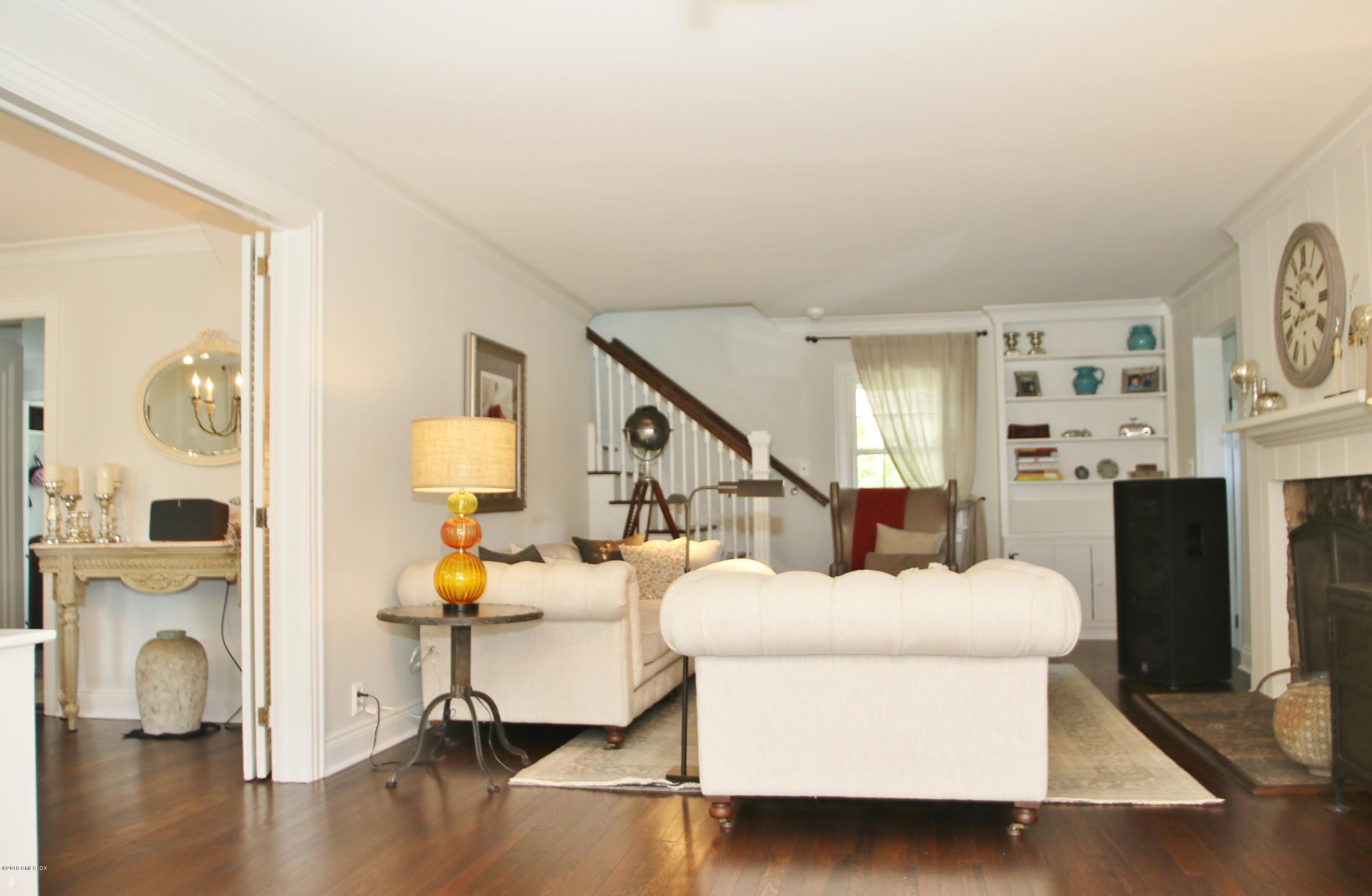 14 Terrace Avenue Riverside, CT 06878 - Photo 3 of 28 a living room with furniture and a fireplace