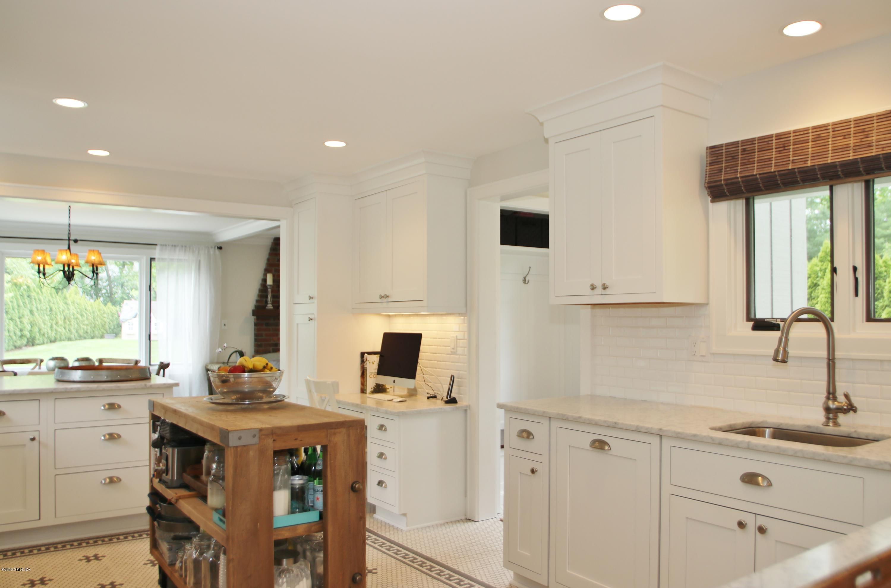 14 Terrace Avenue Riverside, CT 06878 - Photo 10 of 28 a kitchen with cabinets a sink and appliances
