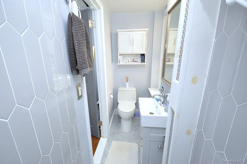 192 Garth Road, Unit TP Scarsdale, NY 10583 - Photo 25 of 43 The private bedroom wing features two spacious bedrooms and two beautifully updated bathrooms, creating a peaceful retreat from the day. Every detail has been carefully curated to deliver comfort, style, and functionality.