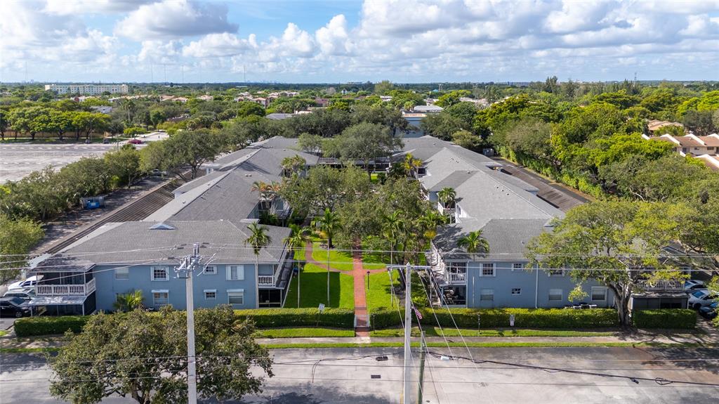 7556 Stirling Road, Unit 222 Hollywood, FL 33024 - Photo 35 of 48 an aerial view of a house with a garden