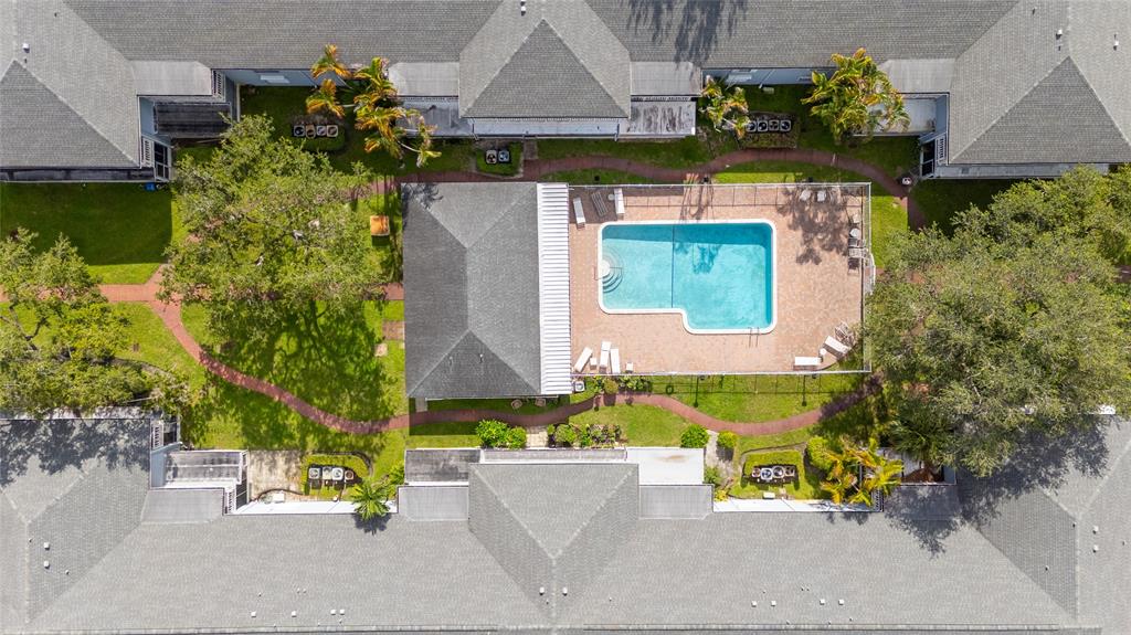 7556 Stirling Road, Unit 222 Hollywood, FL 33024 - Photo 4 of 48 an aerial view of a house with a swimming pool
