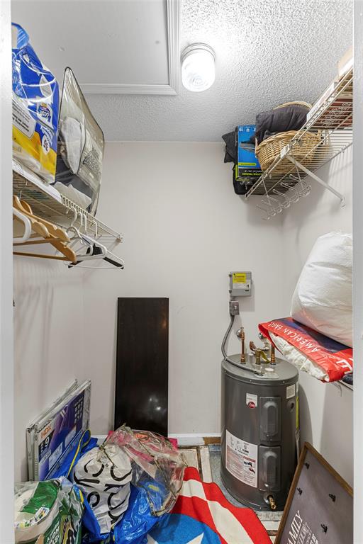 7556 Stirling Road, Unit 222 Hollywood, FL 33024 - Photo 9 of 48 a bedroom with a bed and cabinets