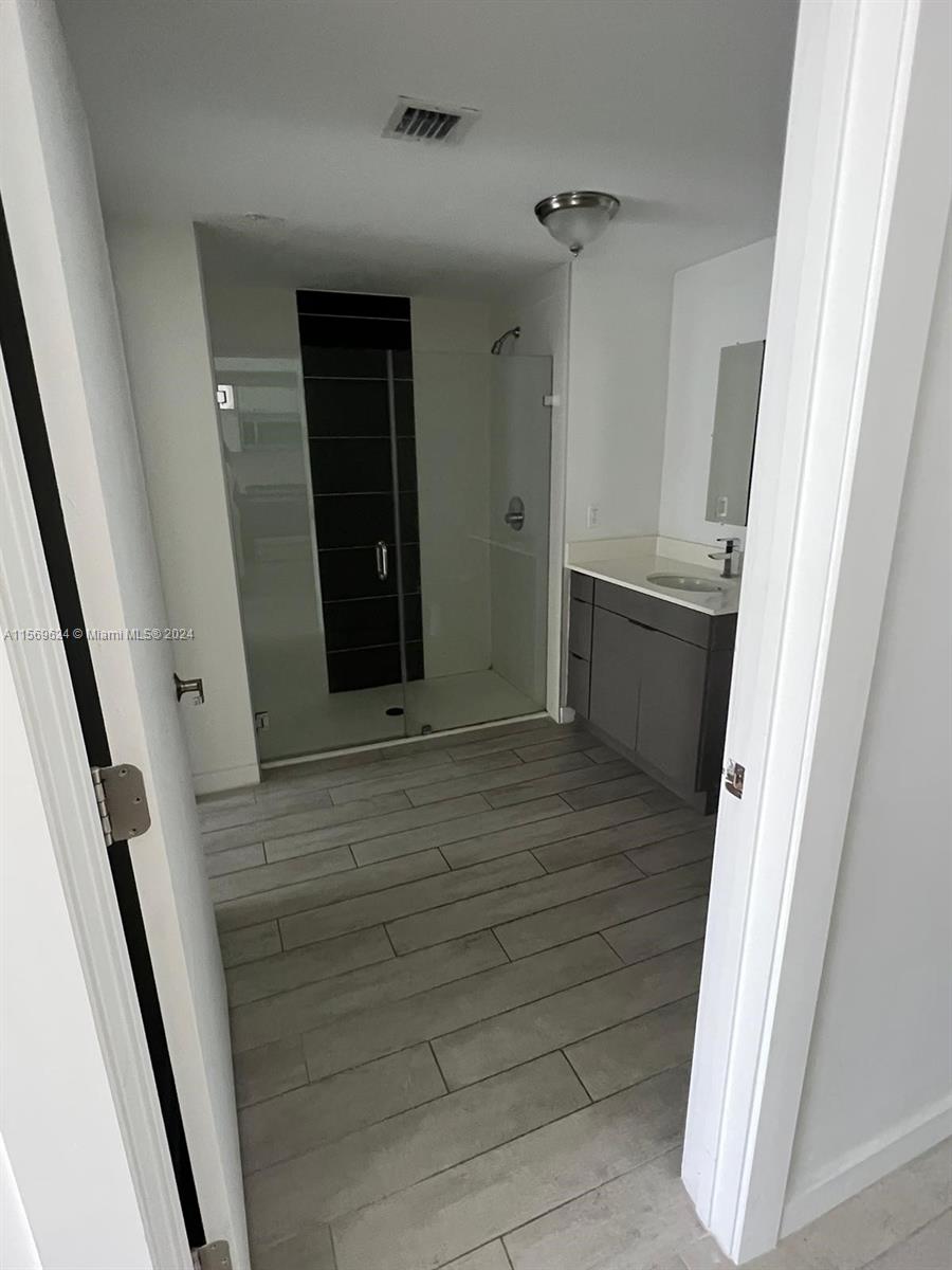 321 Northeast 26th Street, Unit 712 Miami, FL 33137 - Photo 5 of 8 a view of walk in closet