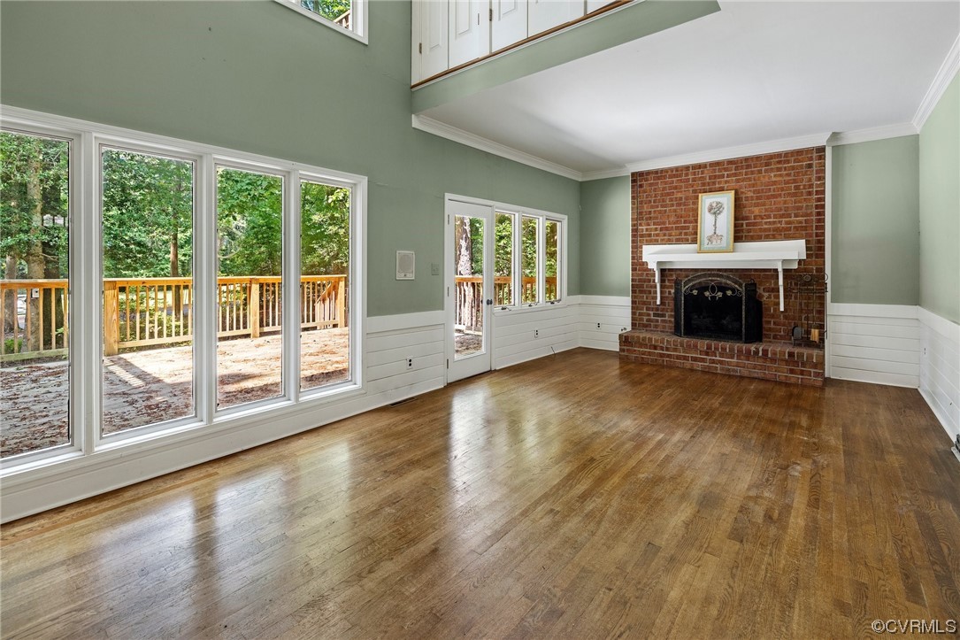 3828 Timber Ridge Road Midlothian, VA 23112 - Photo 11 of 34 wooden floor fireplace and windows in an empty room