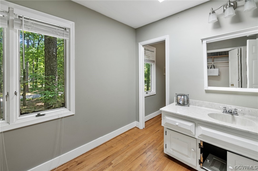 3828 Timber Ridge Road Midlothian, VA 23112 - Photo 23 of 34 a bathroom with a sink and a mirror