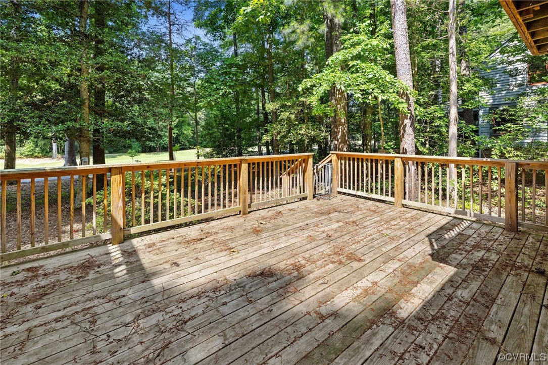 3828 Timber Ridge Road Midlothian, VA 23112 - Photo 34 of 34 a balcony with trees in front of it