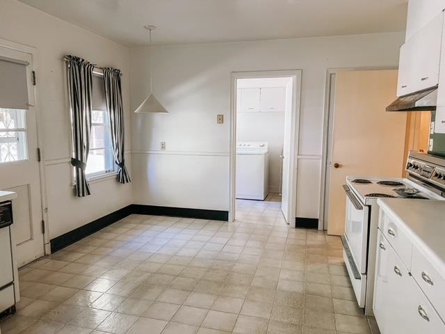 5208 Gwynne Road Memphis, TN 38117 - Photo 3 of 12 a view of a kitchen with a sink and a stove top oven