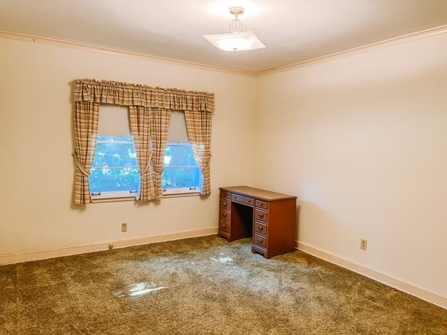 5208 Gwynne Road Memphis, TN 38117 - Photo 10 of 12 an empty room with windows