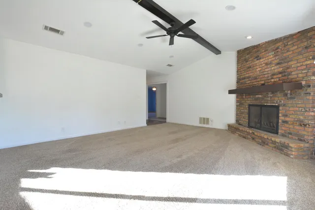 a view of a kitchen with a sink cabinet and a kitchen view