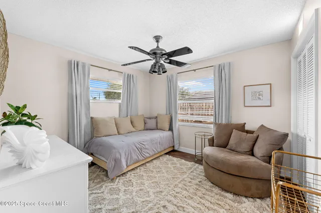 an aerial view of a house with swimming pool