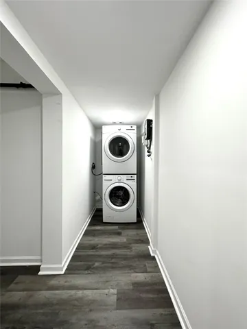 a view of a livingroom with wooden floor