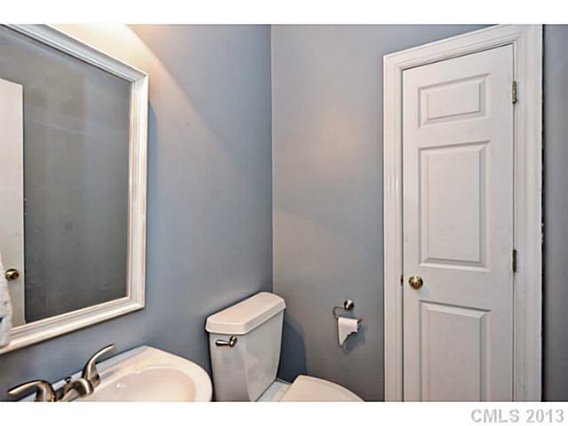 7603 Rathlin Court Charlotte, NC 28270 - Photo 12 of 15 a bathroom with a sink and a toilet